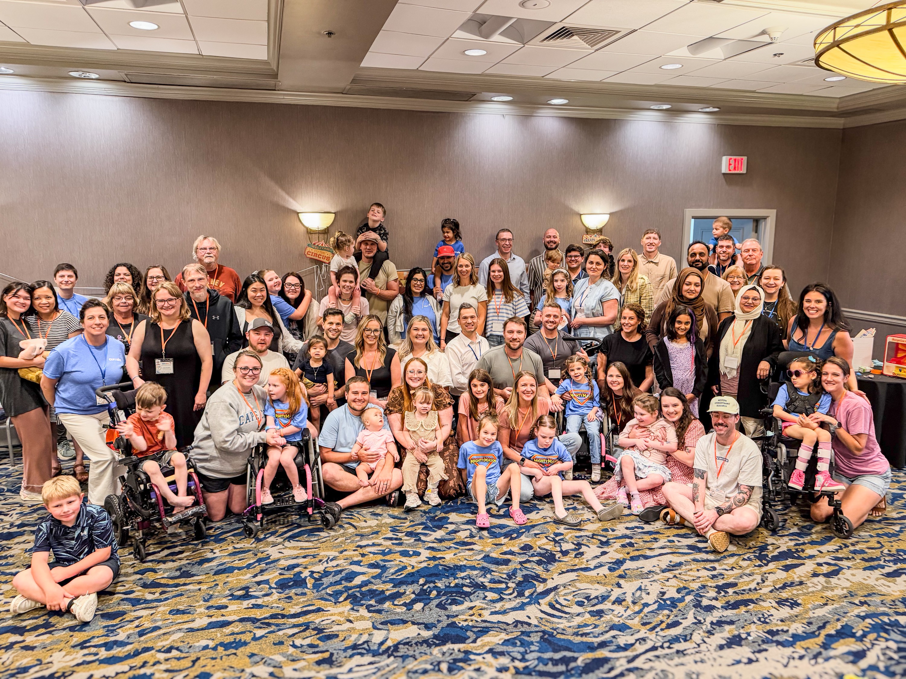 Families pose together at AHC Family Meeting
